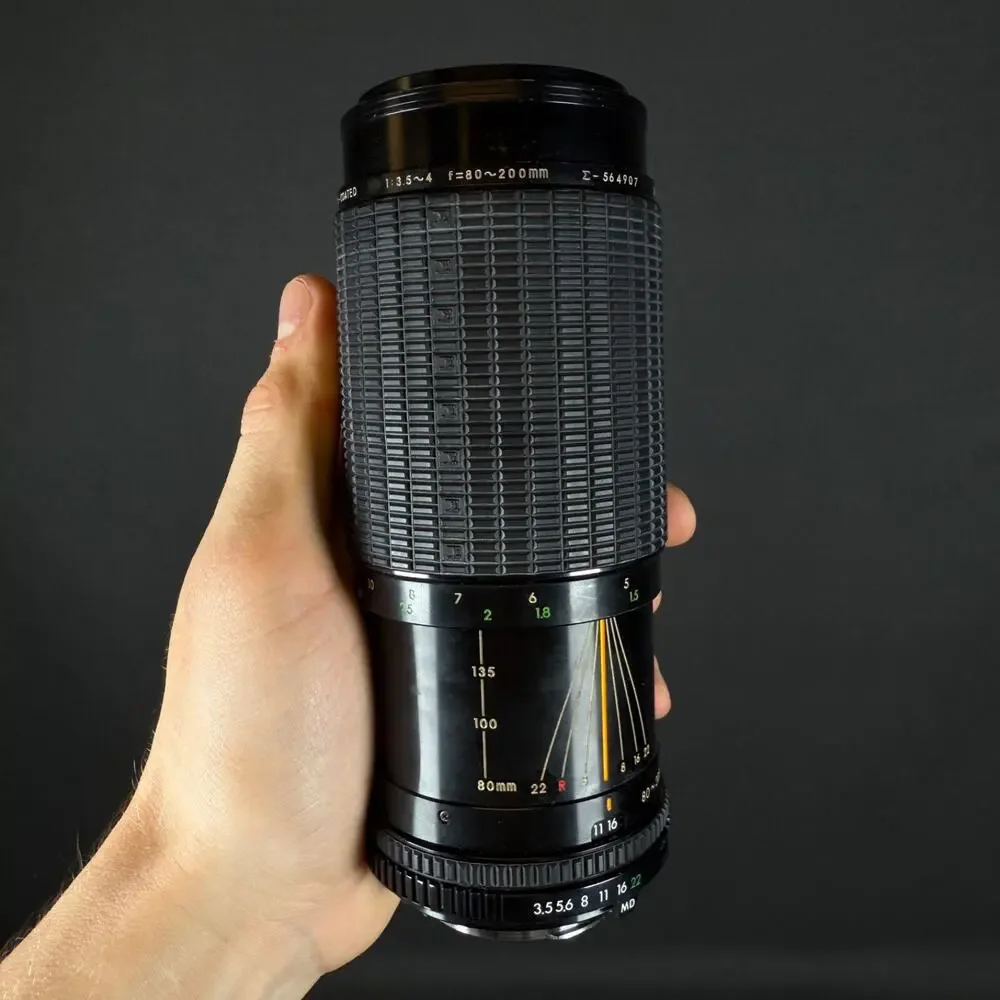 Sigma High-Speed Zoom-C 80-200mm 3.5-4 with case and lenses